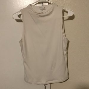 TAHAR women’s white sleeveless shirt. Work or casual attire
